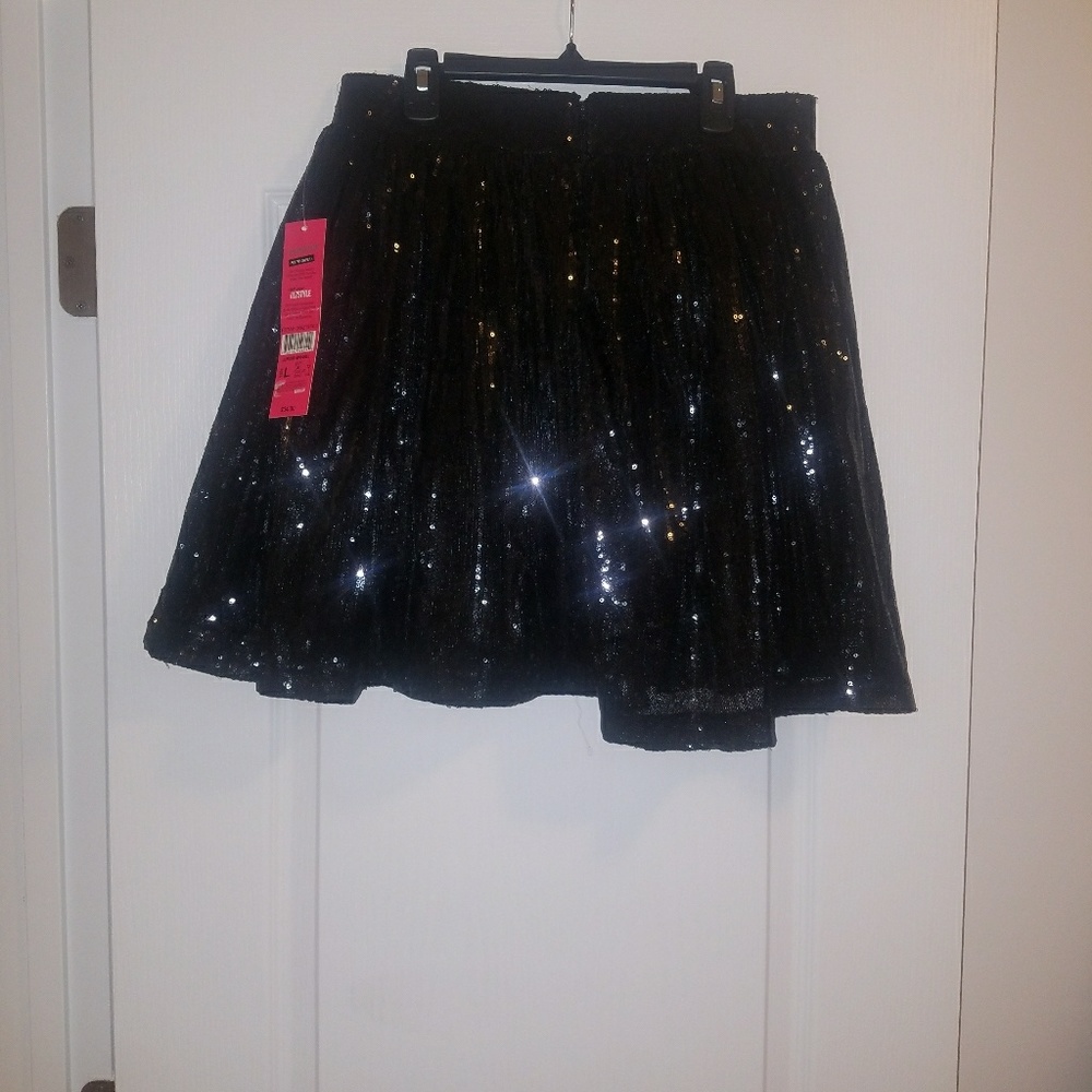 Black sequin knee length skirt